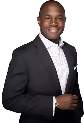 Bryan Williams posing in a suit